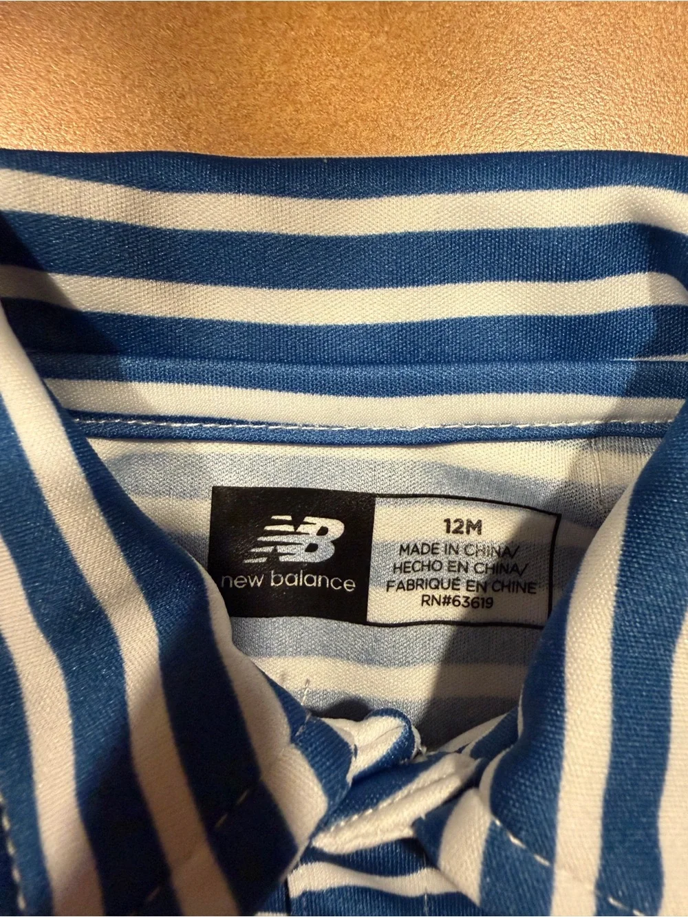 New Balance Striped Polo Shirt